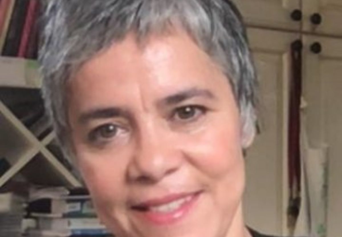 Headshot of Elizabeth Saez-Ackermann.